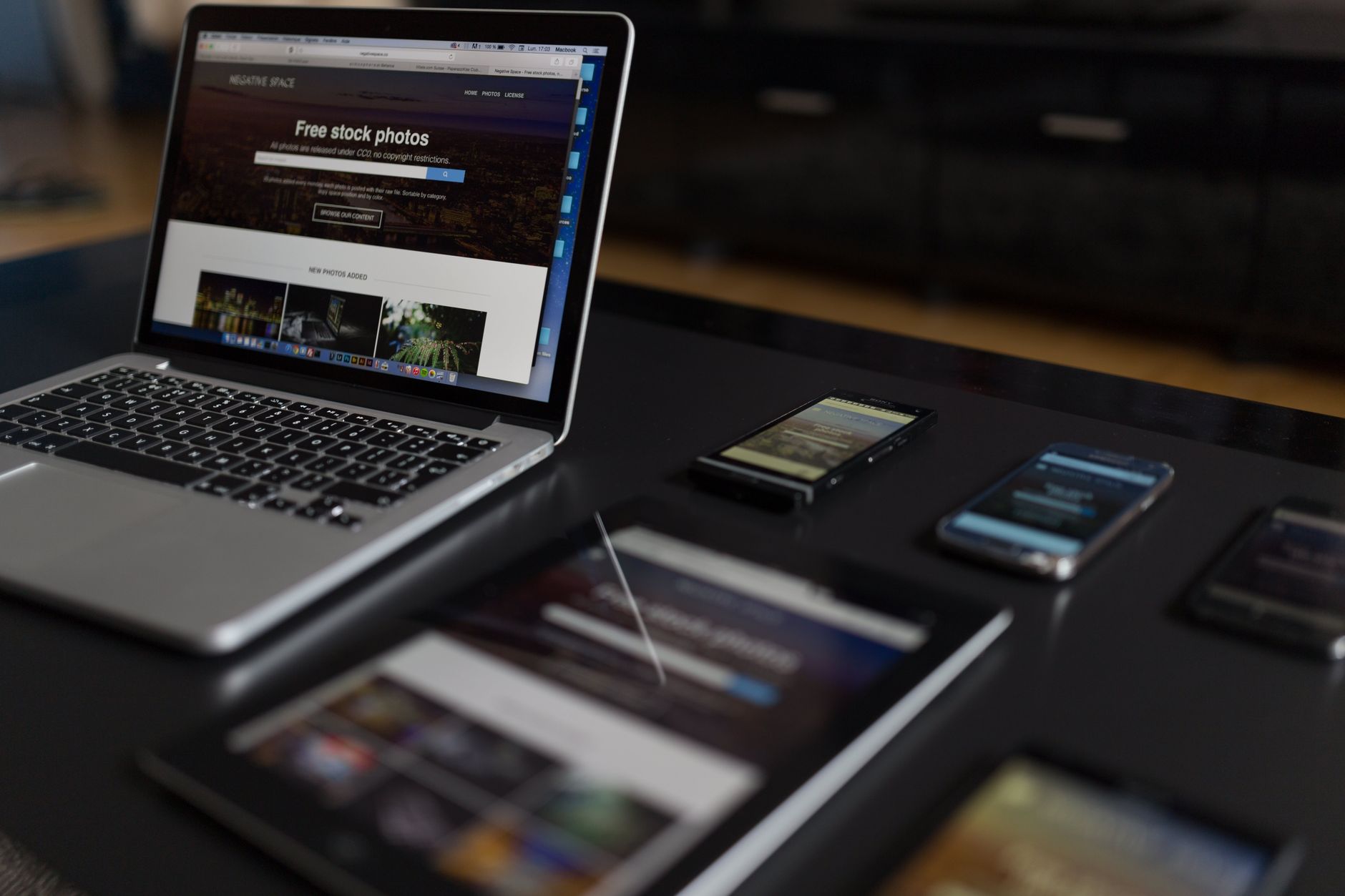 Stock photo by Negative Space via Pexels, illustrating laptop smartphone office desk devices (temporary placeholder pending custom hero design).