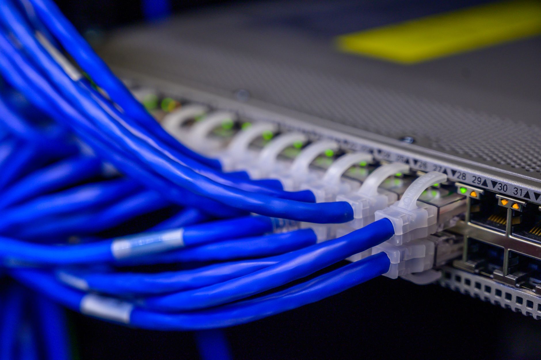 Stock photo by Brett Sayles via Pexels, illustrating network cables switch data center (temporary placeholder pending custom hero design).