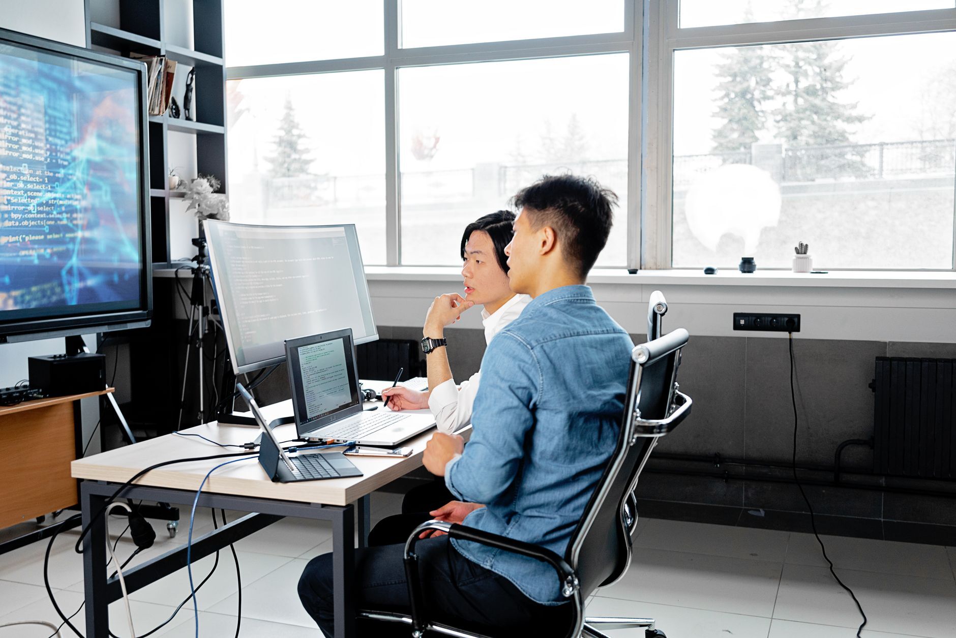 Stock photo by Mikhail Nilov via Pexels, illustrating team reviewing deployment pipeline screens (temporary placeholder pending custom hero design).