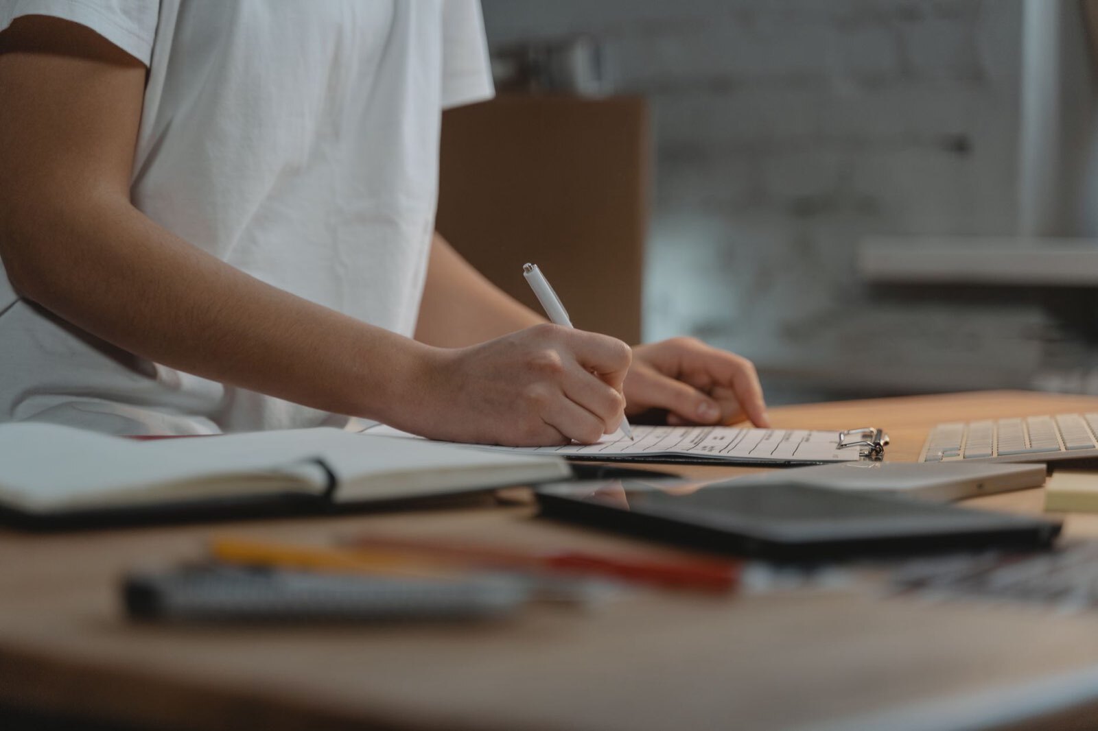 Stock photo by Tima Miroshnichenko via Pexels, illustrating professional writing checklist clipboard desk (temporary placeholder pending custom hero design).