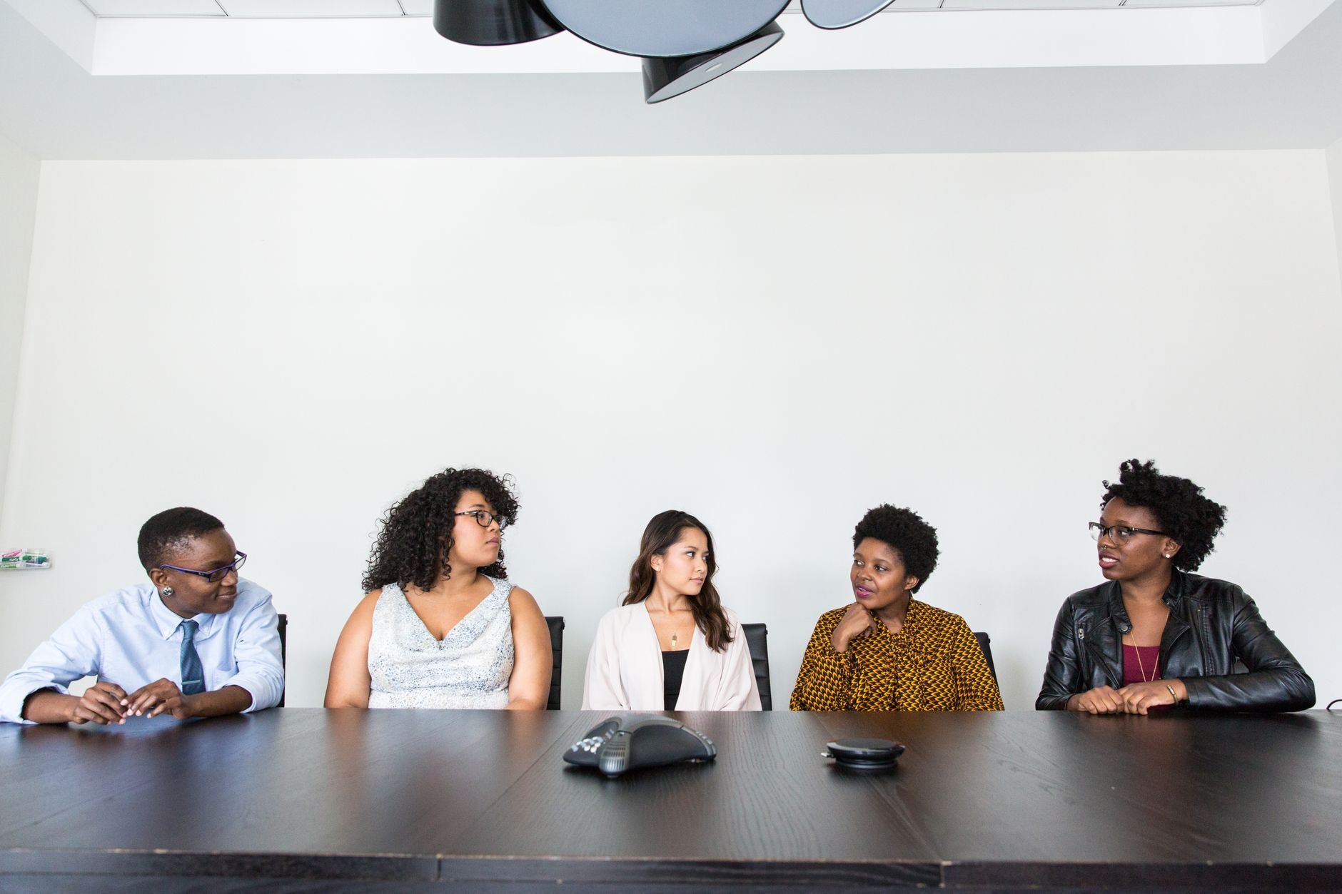 Stock photo by Christina Morillo via Pexels, illustrating team meeting communication (temporary placeholder pending custom hero design).