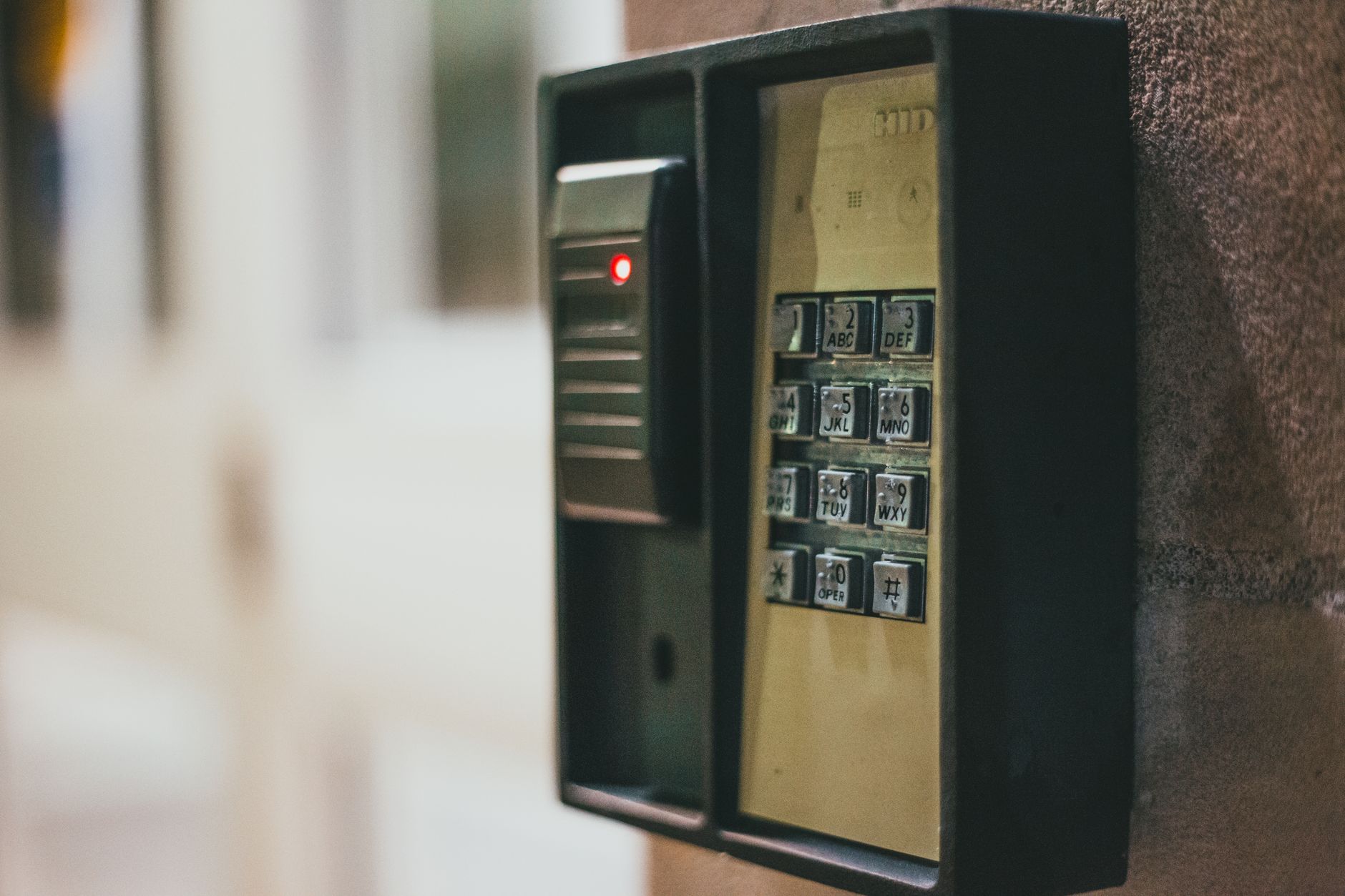 Physical access-control keypad and card reader, illustrating role-based access and least privilege for SOC 2 CC6.3.