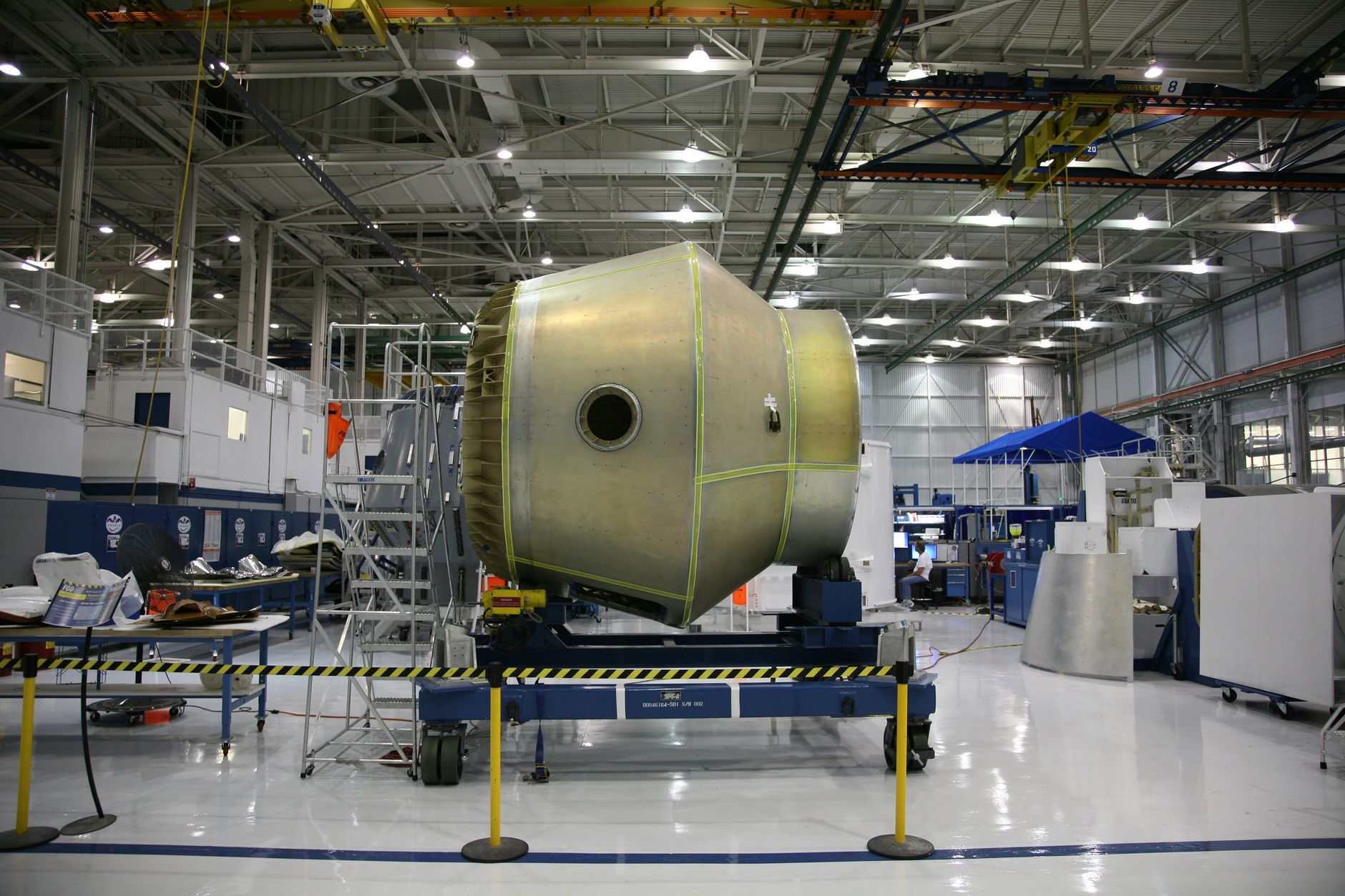 Heavy detail of spacecraft placed on rolling platform under construction at futuristic rocket factory, illustrating Top CPCSC Consultants in Canada (2026): A Buyer's Guide