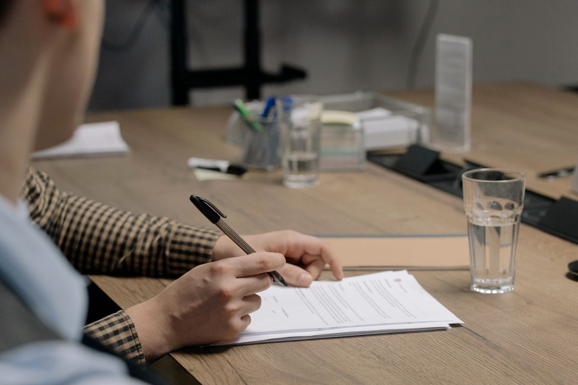 Stock photo by cottonbro studio via Pexels, illustrating reviewing contract documents office desk pen (temporary placeholder pending custom hero design).