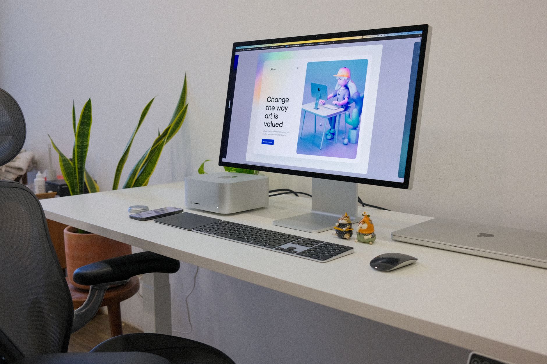 A Mac desktop computer on a white desk, the kind of machine that can host a self-hosted OpenClaw AI agent in a virtual machine